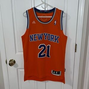 Used men’s adidas Knicks Iman shumpert orange alternate jersey, size small